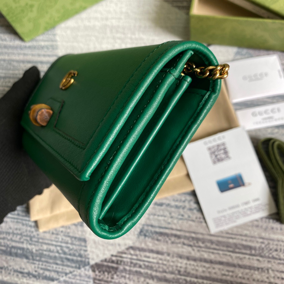 658243 Gucci Diana chain wallet with bamboo