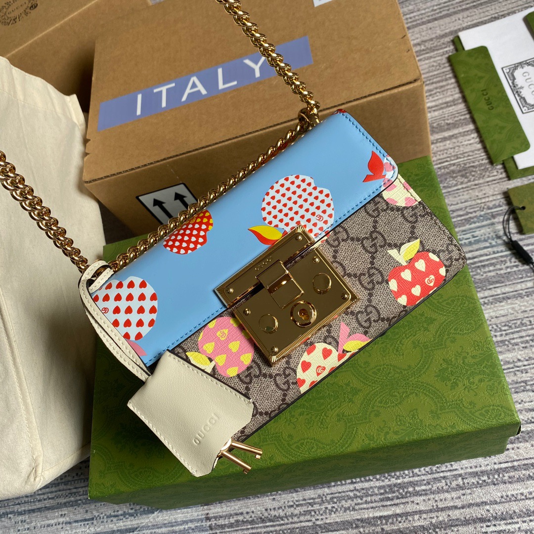409487 GUCCI LES POMMES Padlock small GG shoulder bag