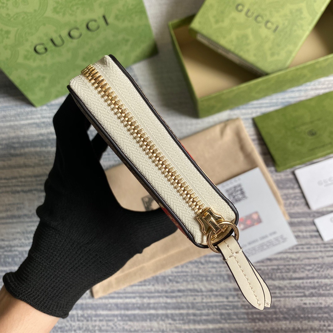 663924  Gucci Les Pommes zip around wallet