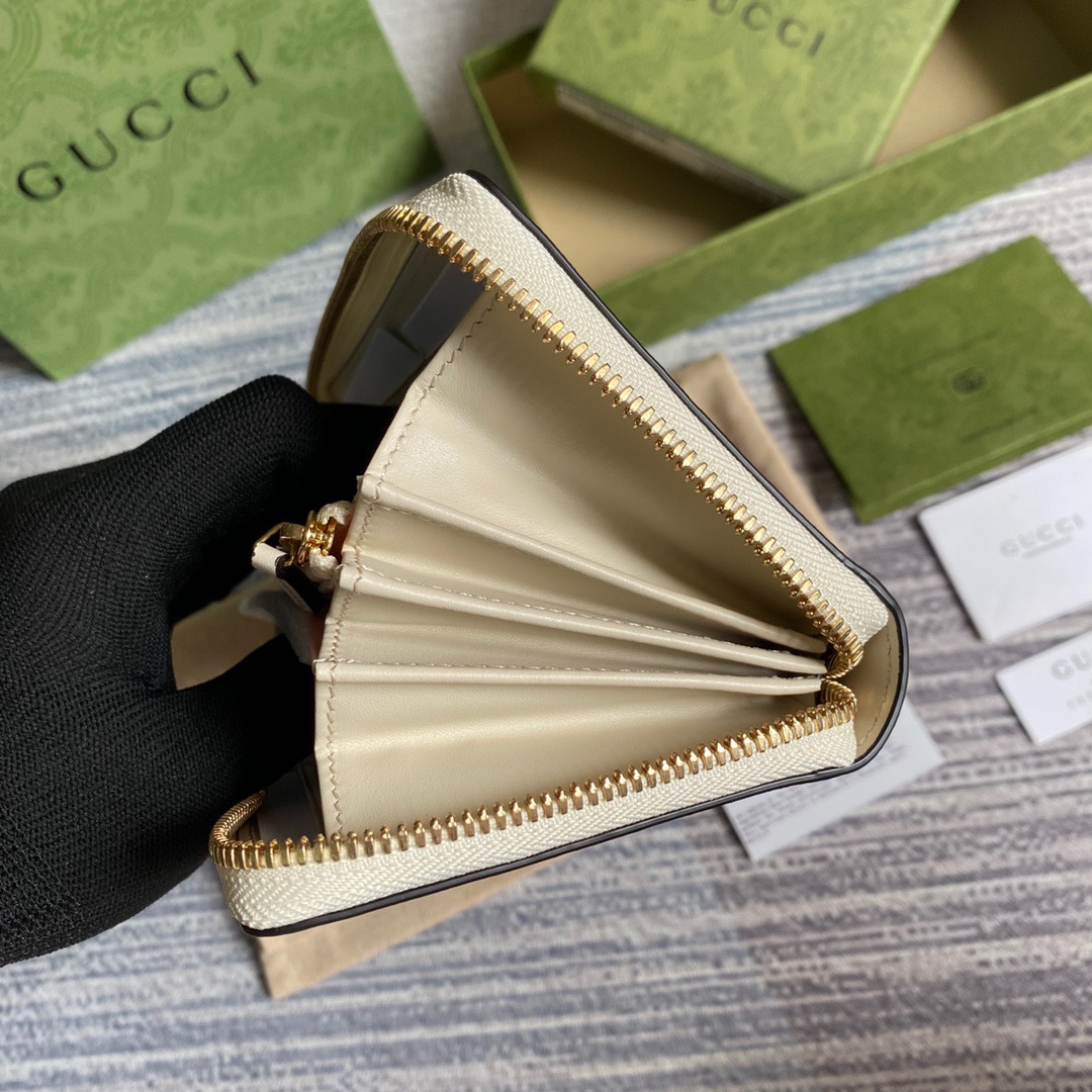 663924  Gucci Les Pommes zip around wallet
