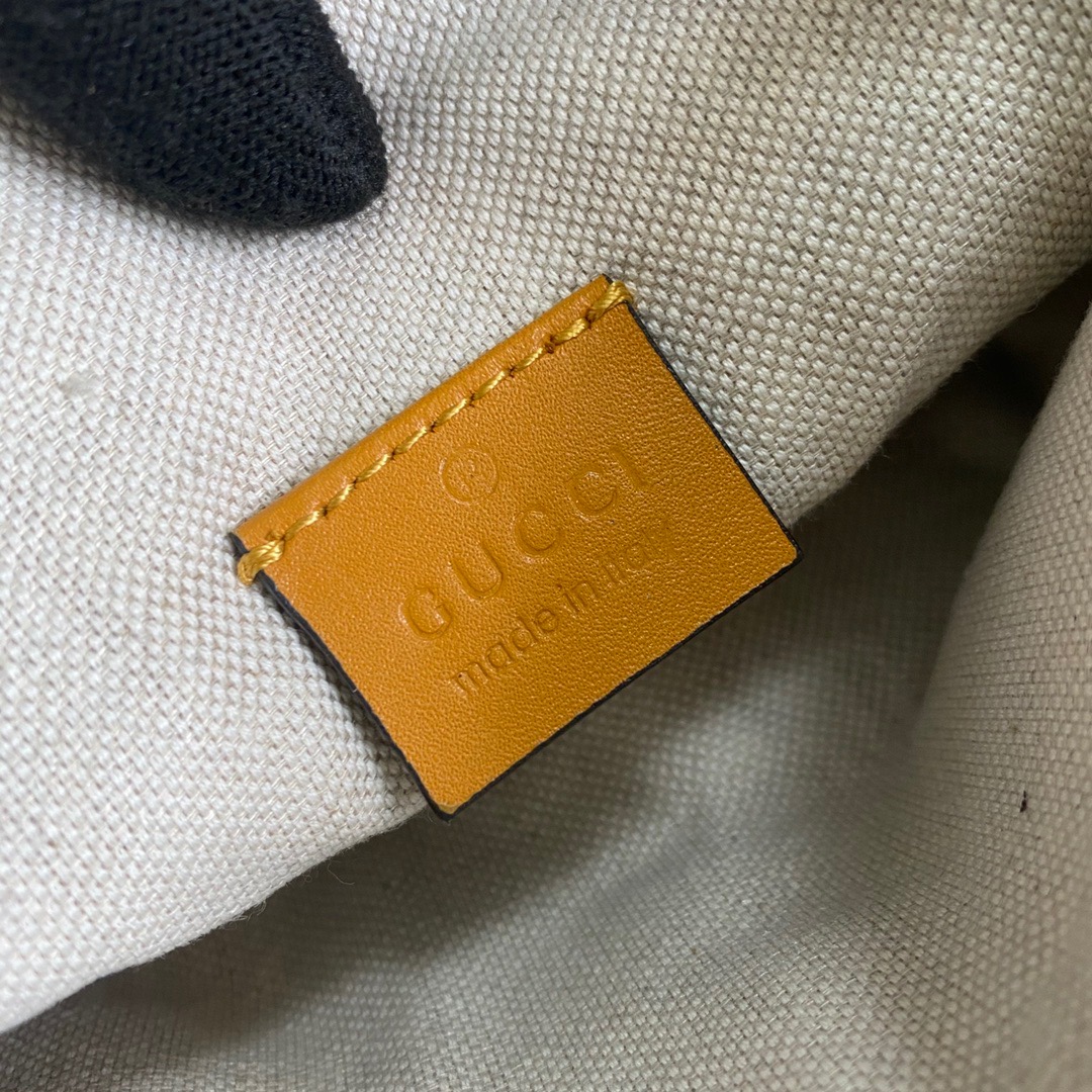 658582 GG embossed belt bag