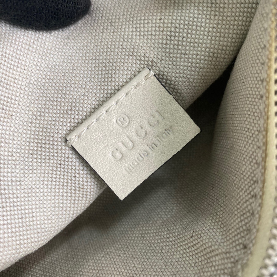 658582 GG embossed belt bag
