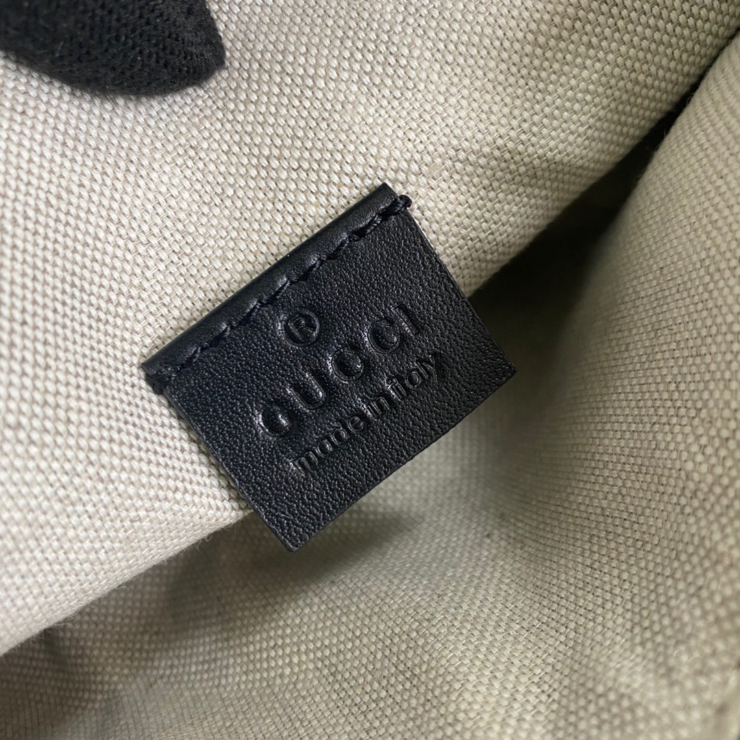 658582 GG embossed belt bag