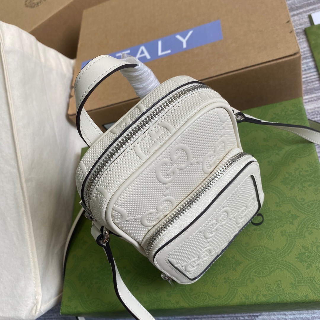 658553 GG embossed mini bag, Travel Bags for Women