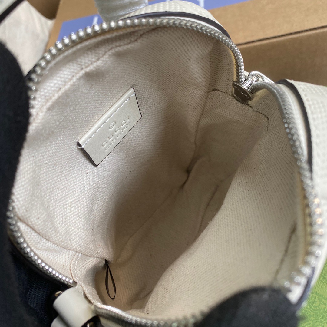 658553 GG embossed mini bag, Travel Bags for Women