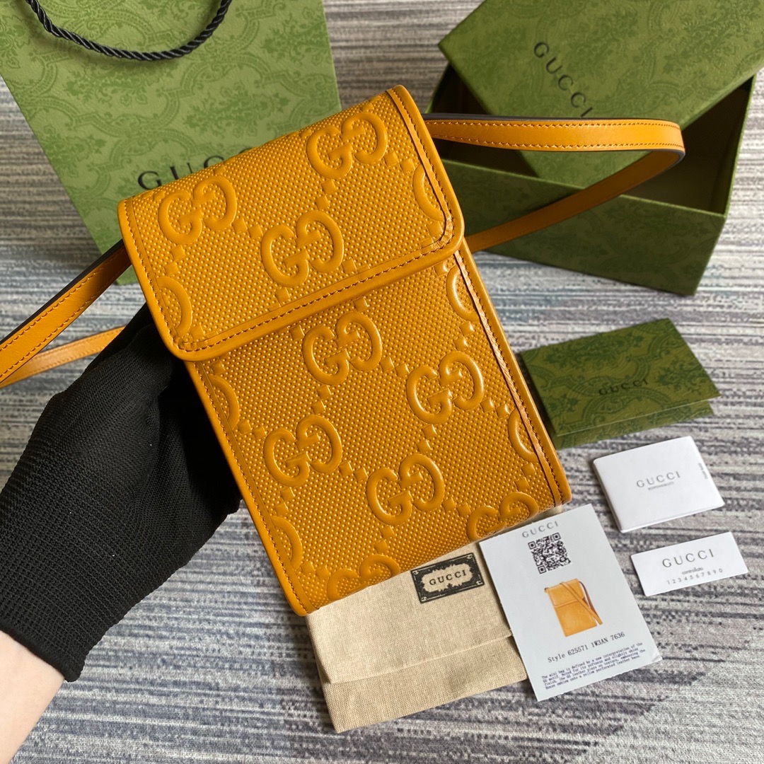 625571 GG embossed mini bag, gucci Strapped Wallets for Men