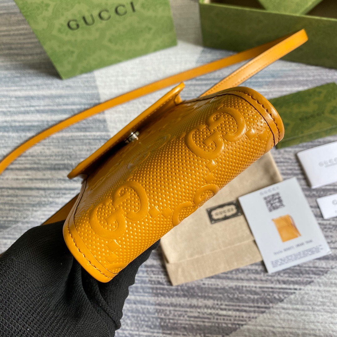 625571 GG embossed mini bag, gucci Strapped Wallets for Men