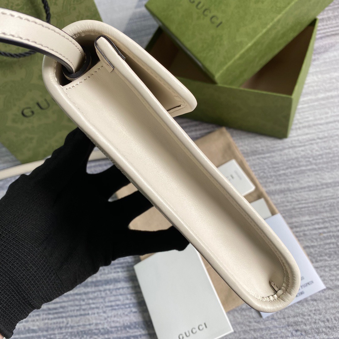 625571 GG embossed mini bag, gucci Strapped Wallets for Men