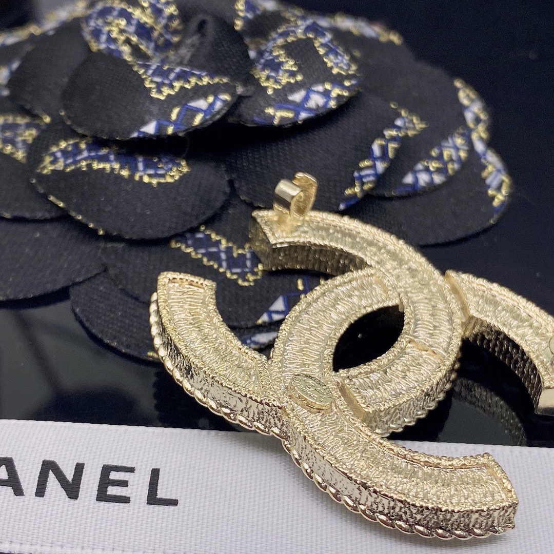 CHANEL BROOCHES