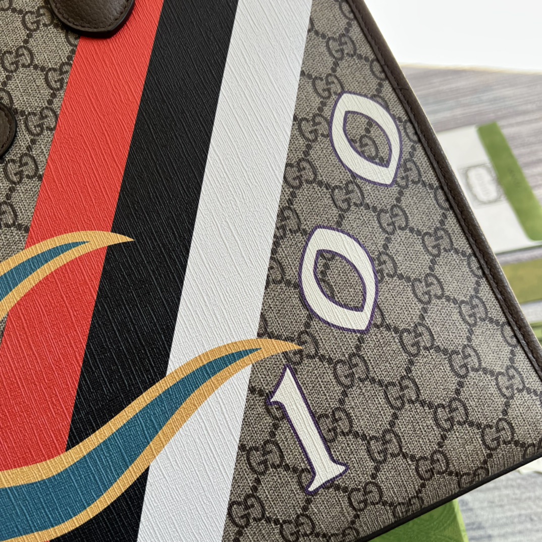 674148 Medium tote with geometric print, gucci Bags for Men