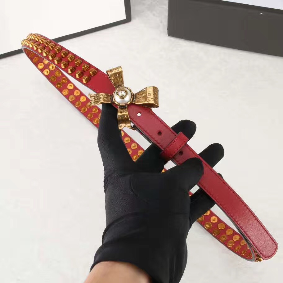 Studded leather belt WITH metal bow, GUCCI Belts