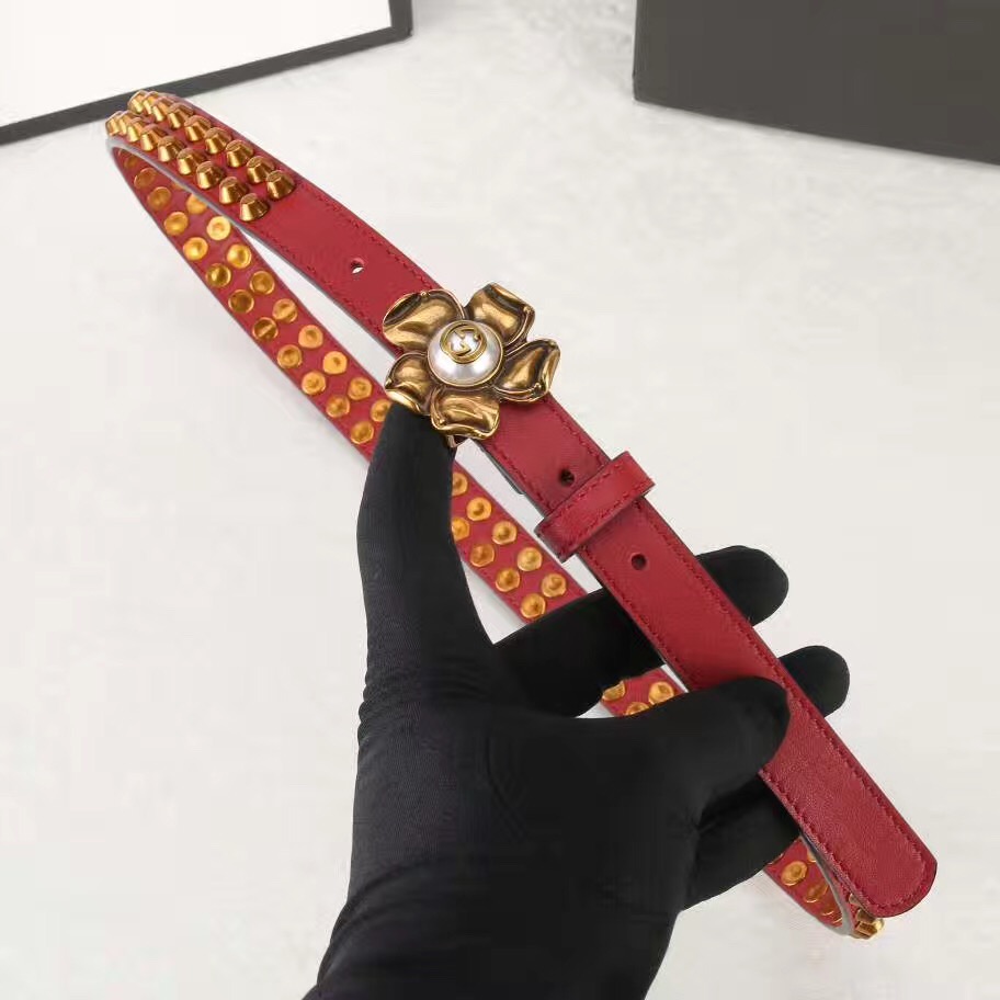 Studded leather belt WITH metal FLOWER, GUCCI Belts