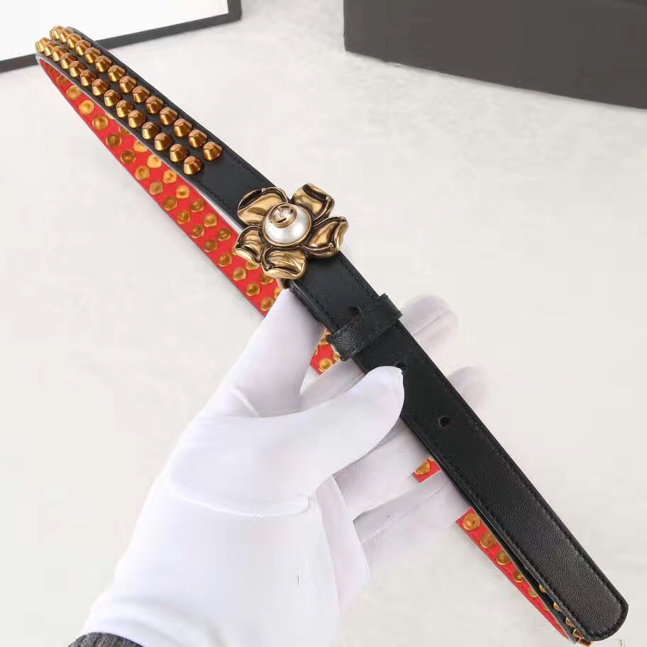 Studded leather belt WITH metal FLOWER, GUCCI Belts